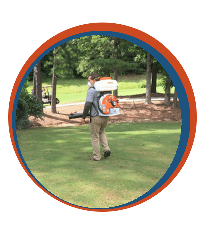 Technician Treating for Mosquitoes